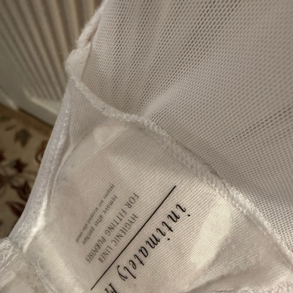Free People intimately. Sheer White/Ivory Mesh body suit.NWT size small